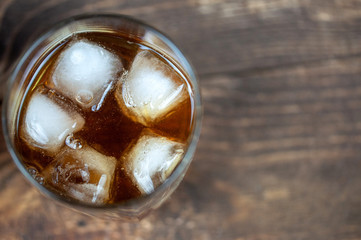 bottle of whiskey with a glass