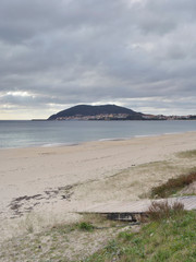 Finisterre Cape from the Langosteira beach, on the Galician Atlantic coast, Spain. This beach is one of the last stages for pilgrims of the Jacobian way.