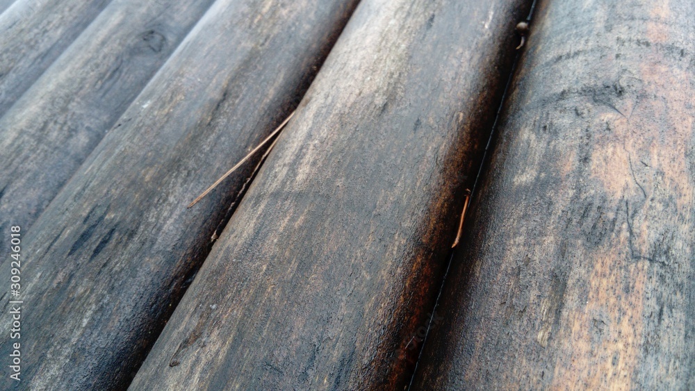 Poster the effect of moisture on wood. a construction log for use in construction without longitudinal sawi