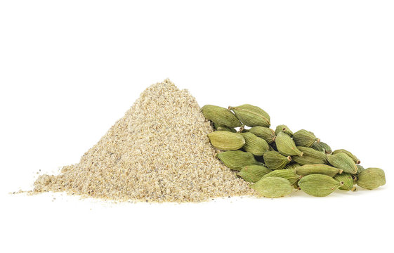 Cardamom powder and pods isolated on a white background