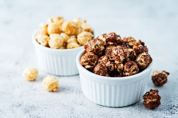 Caramel and chocolate sweet Popcorn in a white bowl