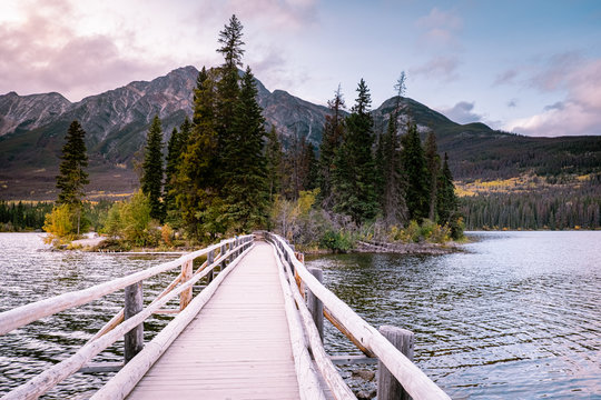Pyramid lake Jasper during autumn in Alberta Canada, fall colors by the lake during sunset, Pyramid Island Jasper