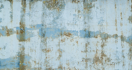 Painted in blue metal rusted background. Metal rust texture. Erosion metal. Scratched and dirty texture on outdoor rusted metal wall.