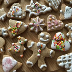 Gingerbread cookies with colorful decoration - gingerbread man, snowflakes, Christmas trees, bears, deers, hearts