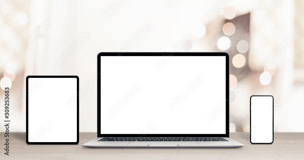 Aufkleber phone, tablet and laptop computer mockup on work desk for responsive web design, or app promotion