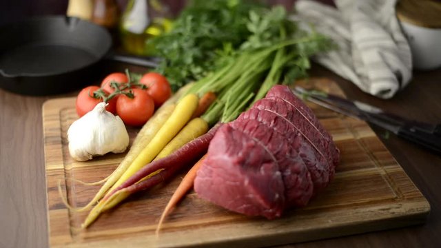 tied top round beef for roast beef with vegetable