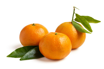 three fresh seasonal tangerines on white background