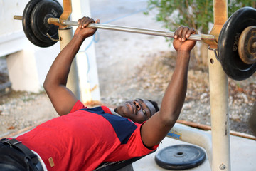 A Ghanaian African boy doing exercise and playing on the field Handsome fashionable fit & Healthy unique Hairstyle 