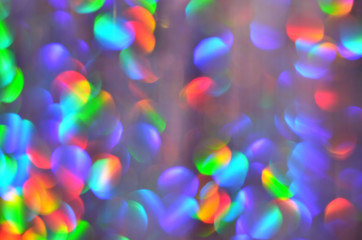 Shiny abstract background with festive defocused lights, colorful bokeh. Christmas or New Year...
