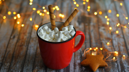 Christmas composition. Coffee cup and Christmas decorations on wooden background. Merry Christmas and Happy new Year