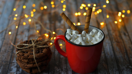 Christmas composition. Coffee cup and Christmas decorations on wooden background. Merry Christmas and Happy new Year