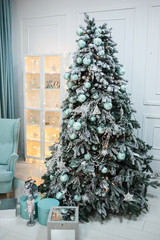 Cozy Christmas atmosphere at home and Christmas tree