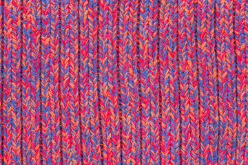 Knitted sweater texture. Pink melange pattern. Background. Copy space