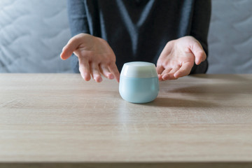 Woman doing the manicure. Removing the polish and putting on the cream. Woman that care his hands. Style concept.
