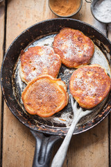 Pancakes with apples, cinnamon and icing sugar 