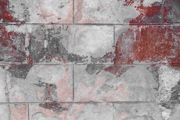 Beautiful colorful artistic concrete blocks texture background. White, grey, pink and red paint on the brick wall. Close up, copy space