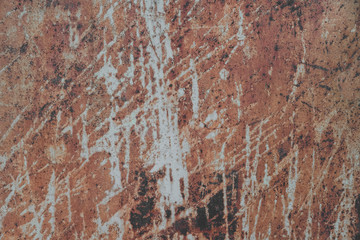 Rusty metal texture background. Old worn  iron plate with peeled off paint and scratches. Toned, close up, copy space