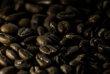 Soft image of roasted brown coffee beans.