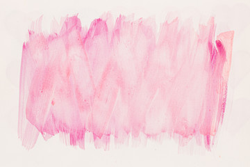 Abstract pink watercolor on white background.The color splashing in the paper.It is a hand drawn.