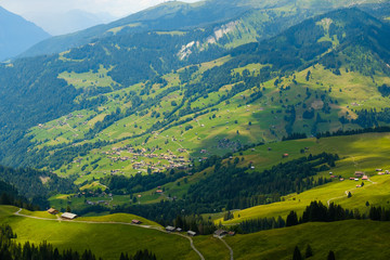 Fototapeta na wymiar Summer time countryside panoramic landscape in Switzerland