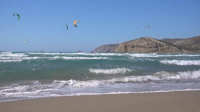 Prasonisi Kite Beach, Mediterranean sea, kite surfers ride on the sea, Rhodes island Greece.