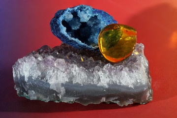 Quartz also called deep quartz with mineral inclusions in the studio in front of black background...