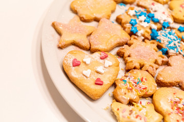 Plate with homemade decorated cookies