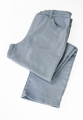 Gray pair of pants isolated in light background