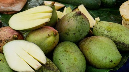 Raw mango piles