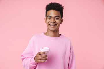 Portrait of a smiling african teenager boy wearing pullower
