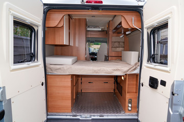 Interior of vanlife campervan coach with luxury equipment