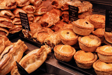 Selection of savoury pastries and pies in a butchers shop © Steve McHale