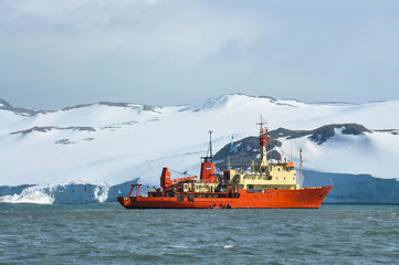 Travel on the scientific vessel. Oceanographic ship over the seawaters of Antarctica