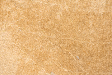 Aged paper texture. Yellow old blank sheet from an ancient book. Background