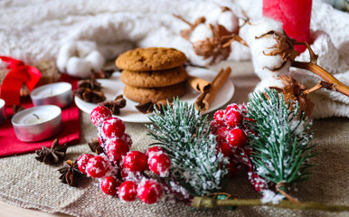 Holiday background with cookies and candles. Winter mood