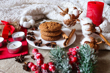 Fototapeta na wymiar Holiday background with cookies and candles. New Year mood