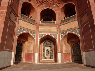 Fototapeta premium Arcades on the main facade of the Humayun's Tomb. Tomb of the Mughal Emperor Humayun in Delhi, India. Declared a UNESCO World Heritage Site in 1993