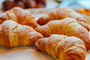 detail of a group of delicious freshly baked croissants - 309275252