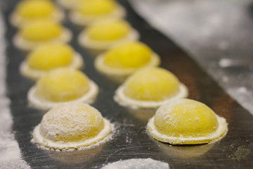 detail of handmade ricotta ravioli ready to be cooked