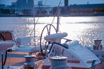 Obraz premium Luxury yacht tied to pier as symbol of travel and freedom.