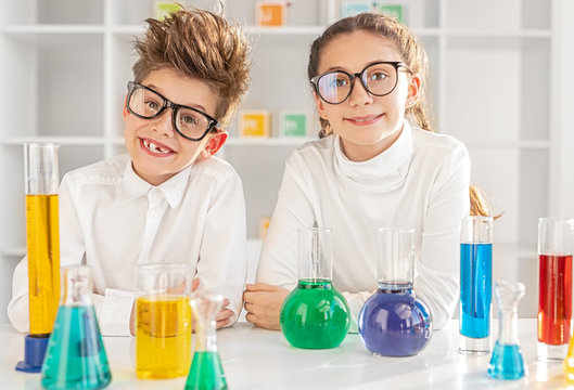 Funny children carrying out experiments