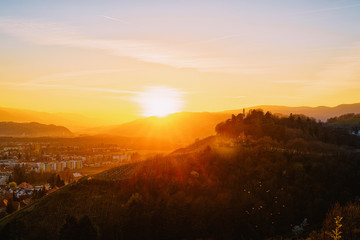 Romantic sunset Landscape and cityscape with vineyards in Maribor
