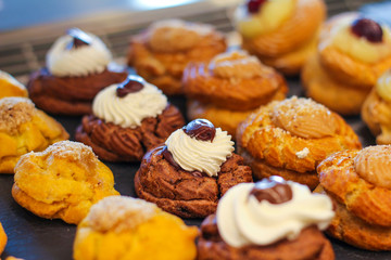 rows of chocolate and cream variegated bigne in italian pastry