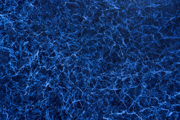 Blue background. Artificial stone.