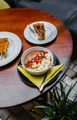 Healthy oat meal with cocoa, bananas and goji berries. 