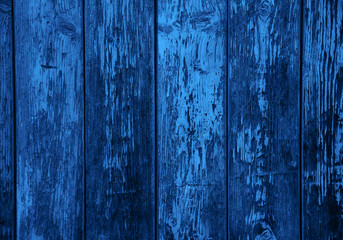 Fototapeta na wymiar Classic blue color dark old wooden texture background. Concept color of the year 2020. Copy space. Grunge texture