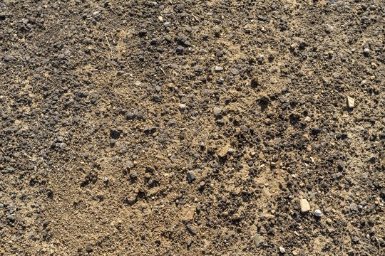 High angle shot of a deserted rocky stone texture of the soil
