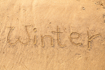 Winter Schriftzug in den Sand geschrieben