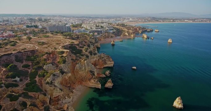 Aerial. 4K video from the sky of the portuguese beaches of the Algarve Lagos.