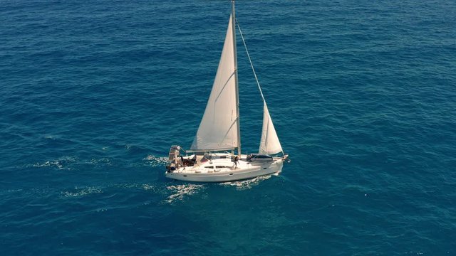 Yacht Sailing On Opened Sea. Sailing Boat. Yachting Video. Yacht From Above. Yachting At Windy Day. Yacht. Sailboat.